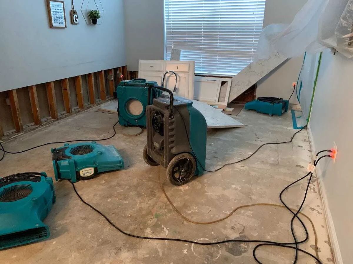 Dehumidifier in flood-cut room for Water Damage Restoration in Oneonta